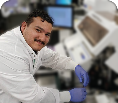 MERA employee smiling at desk