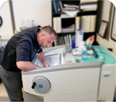 MERA technician repairing equipment