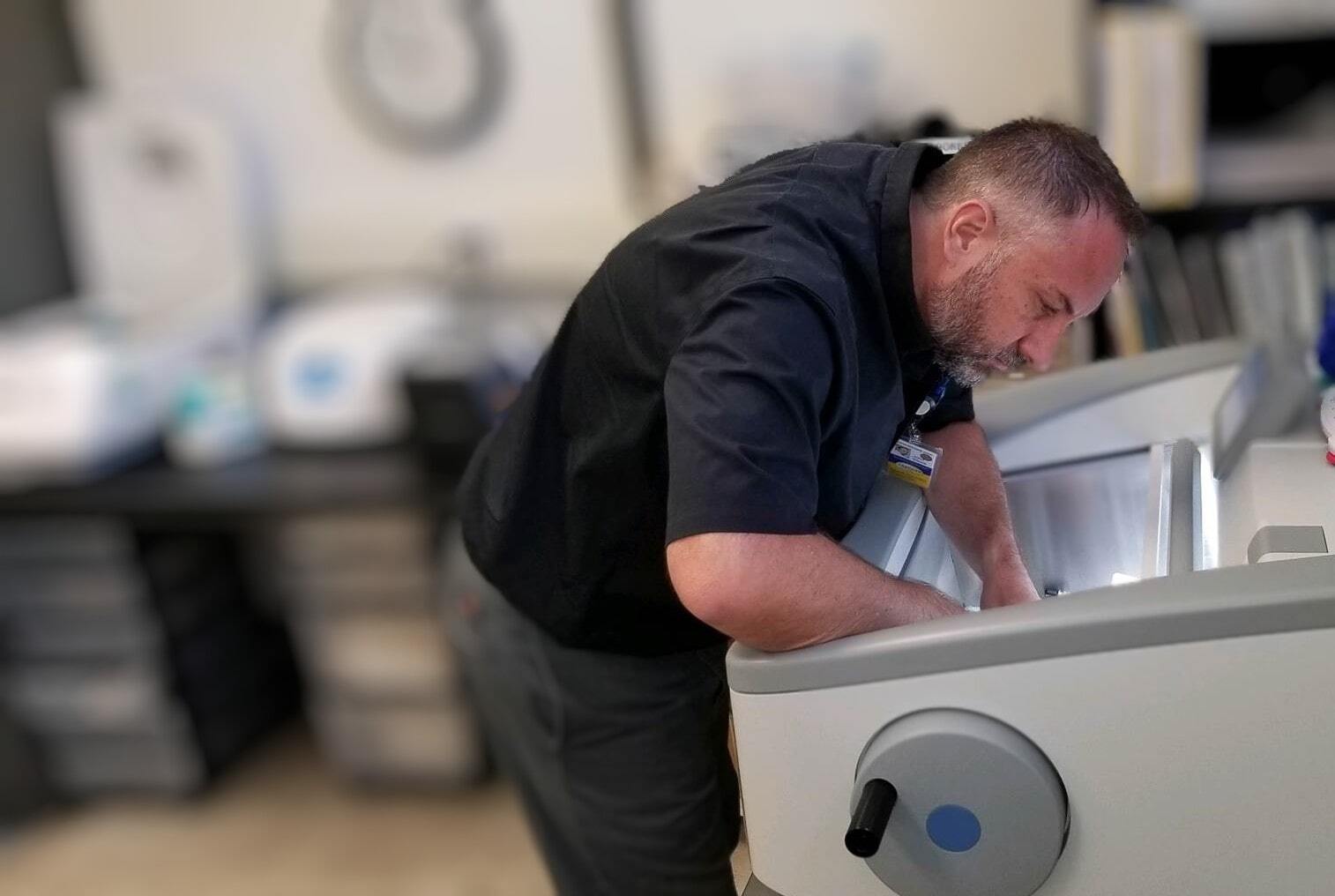 Employee working on equipment