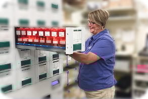 woman with medicine in pharmacy